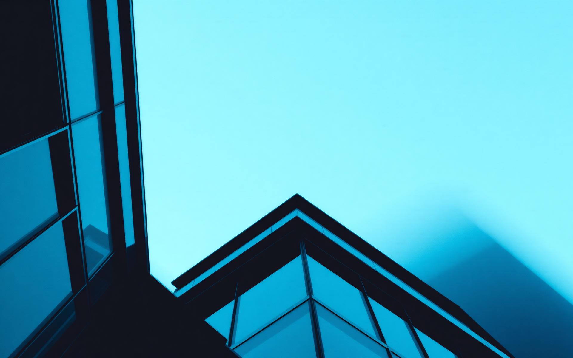 Modern architectural facade against a clear sky